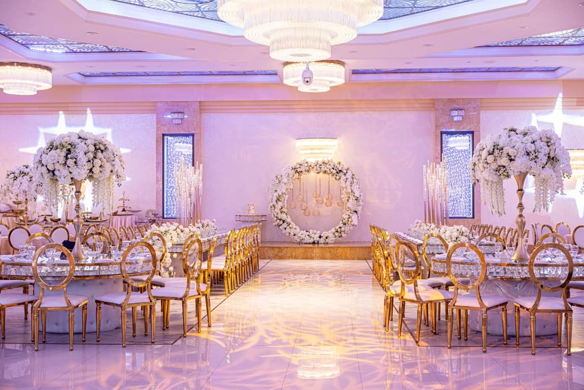 Ballroom wedding reception with floral decor